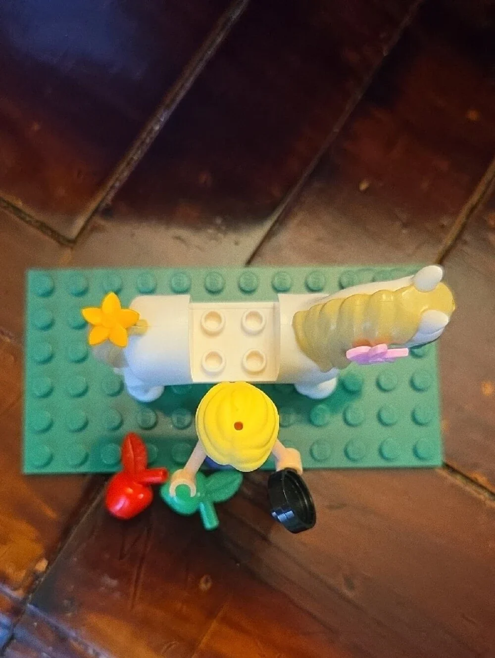 LEGO Rapunzel mini figure riding her horse, Maximus.